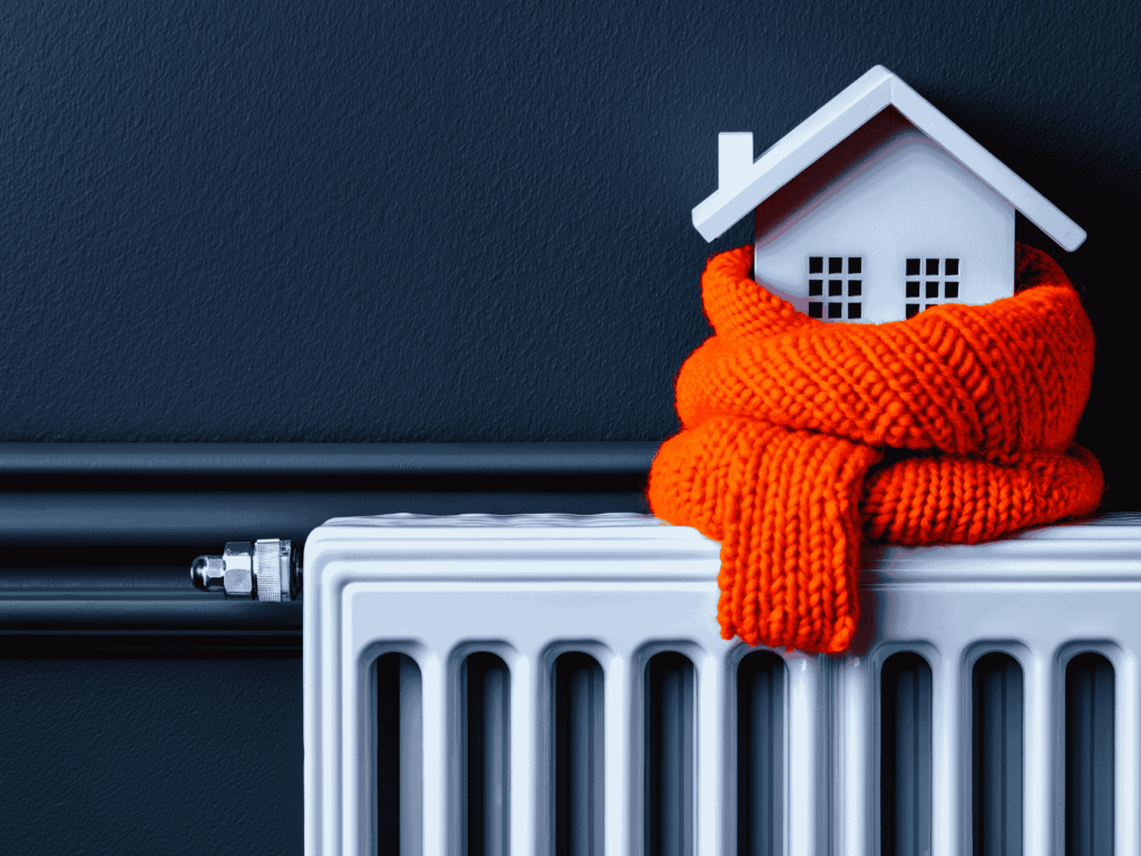 chauffage à pau installé par Lo Piccolo avec une petite maison et une écharpe par dessus